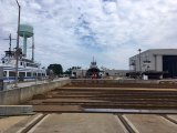 The rail car can then connect to a moving rail that can place the ferry on land or in the paint building. It's easier to understand if you see it in person!